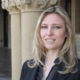 Woman smiling in picture.